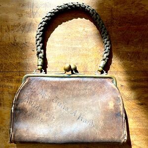 ANTIQUE 120 yr old leather purse from worlds fair 1904.